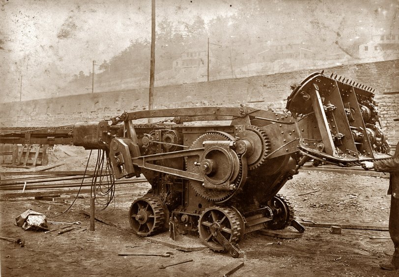 Machine used in mine that digs the coal and loads it on the car. With it three men can do the work of 50 in the old way. Yet they use boys to drive and trap. Gary, West Virginia. September 1908. View full size.
