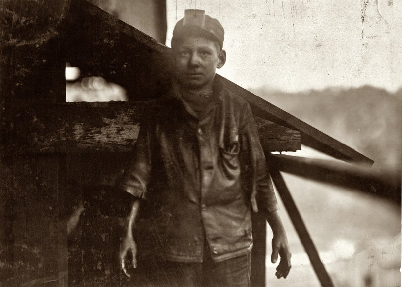 December 1910. "Shorpy Higginbotham, a 'greaser' on the tipple at Bessie Mine, of the Sloss-Sheffield Steel and Iron Co. in Alabama. Said he was 14 years old, but it is doubtful. Carries two heavy pails of grease, and is often in danger of being run over by the coal cars." Photograph and caption by Lewis Wickes Hine. View full size.
