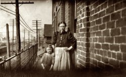 Atlanta, March 1915. Mrs. Dora Stainers, 562½ Decatur St. 39 years old. Began spinning in an Atlanta mill at 7 years, and is in this mill for 32 years. Only 4 days of schooling in her life. Began at 20 cents a day. The most she ever made was $1.75 a day & now she is earning $1 a day when she works. Her little girl Lillie is the same age she was when she started work, but the mother says, "I ain't goin to put her to work if I can help it. I'm goin' to give her as much education as I can so she can do better than I did." Mrs. Stainers is a woman of exceptional ability considering her training. View full size. Photograph and caption by Lewis Wickes Hine.