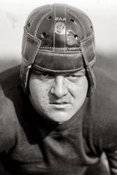 From 1924:  "Fletcher, guard, George Washington University." To download, right click on the image and save to your desktop. From the iPhone, tap the image and hold to save. (View original image).
