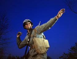 November 1942. "An American pineapple, of the kind the Axis finds hard to digest, is ready to leave the hand of an infantryman in training at Fort Belvoir, Va." View full size. 4x5 Kodachrome transparency by Alfred Palmer.