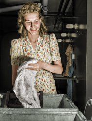 Colorized version of this Shorpy photo. How did she curl her hair like that?  Did she wrap her hair around long strips of cloth? View full size.