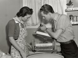 February 1942. "Something the matter with your wringer? It probably needs a few drops of oil. Regular lubrication by your repair man assures smooth functioning of the mechanism. If you attempt to do the job yourself, you may find the family wash oiled." View full size. Medium-format negative by Ann Rosener, OWI.