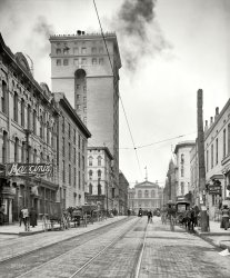 DON'T HITCH HERE, the signs say. But where is "here"? The year is circa 1906. 8x10 inch dry plate glass negative, Detroit Publishing Company. View full size. UPDATE: It took only 13 minutes for an astute Shorpster to give us not only the location (Madison Avenue in Memphis, Tennessee), but also a current photo.