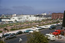 For a change, here are some cars in San Francisco that aren't 90 to 100 years old.  My favorite part, though, is the family photo op in progress over on the left, which I just now noticed. I was in Ghirardelli Square when I took this Kodachrome slide in summer 1966. View full size.