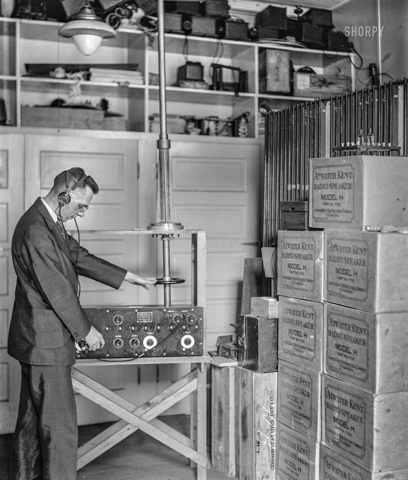 Washington, D.C., circa 1926. "Lt. Edward M. Webster, Coast Guard." Operating a Western Electric Type CGR-1-A radio receiver. 4x5 inch glass negative, National Photo Co. View full size.