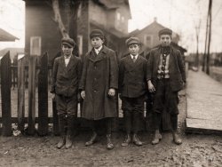 January 1911. Pittston, Pennsylvania. "Four Breaker Boys working in #9 Breaker, Hughestown Borough, Pennsylvania Coal Company. Boy on left is Tony Ross, 142 Panama Street. Other small boy is Mike Ross, cousin." Photo by Lewis Wickes Hine for the National Child Labor Committee. View full size.