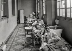 June 14, 1918. "Scene in corridor of American Military Hospital No. 1 at Neuilly, France." Photo by Lewis Hine for the American Red Cross. View full size.