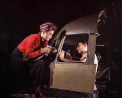 October 1942. "Men and women make efficient operating teams on riveting and other jobs at the Douglas Aircraft plant, Long Beach, Calif. Most important of the many types of aircraft made at this plant are the B-17F 'Flying Fortress' heavy bomber, the A-20 'Havoc' assault bomber and the C-47 heavy transport plane shown here for the carrying of troops and cargo." 4x5 inch Kodachrome transparency by Alfred Palmer for the Office of War Information. View full size.