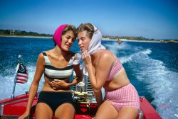 August 1962. Newport, Rhode Island. "Two of Newport's beauties, Minnie Cushing and Topsy Taylor, go water-skiing out near Gooseberry Island. In tow behind their boat is weekend visitor Dick Cowell, a former water-ski champion." 35mm Kodachrome by Toni Frissell for the Life magazine assignment "The Stately World of Newport." View full size.