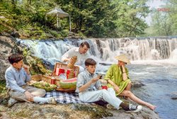 May 1964. 35mm Kodachrome by Toni Frissell for the Life magazine assignment "The Splendor of a Great Family: The Vanderbilts." View full size.
&nbsp; &nbsp; &nbsp; &nbsp; On her country estate near Stamford, Connecticut, Gloria Vanderbilt enjoys a picnic with her husband, Wyatt Cooper, and two sons by her marriage to Leopold Stokowski -- Chris, 12, and Stan, 13. She came upon the picturesque waterfall with its secluded cottage one day and couldn't resist buying it. "It was like something out of a fairy tale," she exclaims.