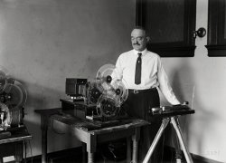 Washington, D.C., 1923. "Inventor C. Francis Jenkins with most recent invention, radio camera with which it will be possible to send pictures by wireless. He hopes to be able to broadcast moving pictures of national events to distant cities immediately after they are photographed." The Jenkins Radio-Picture Transmitter with "prismatic rings." Click here for more electro-mechanical television photos. Harris & Ewing Collection glass negative. View full size.