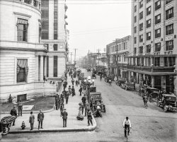 Bustling Jacksonville, Florida, circa 1910. "Forsyth Street looking east from Hogan." As in the previous view, the Post Office is at left, Hotel Seminole on the right. Note the city-issued JACKSONVILLE license plates. 8x10 inch glass negative, Detroit Publishing Co. View full size.