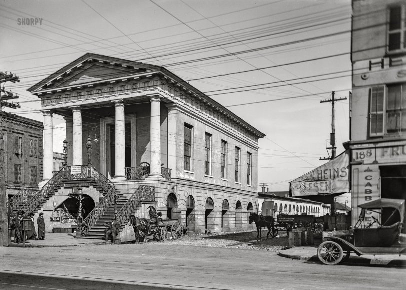Charleston, South Carolina, circa 1915. "Old Public Market." Market Hall on Meeting Street, with signage advertising a "Collection of Confederate Pictures & Relics, Open to Visitors." 5x7 inch dry plate glass negative, Detroit Publishing Company. View full size.