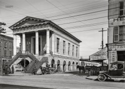 Charleston, South Carolina, circa 1915. "Old Public Market." Market Hall on Meeting Street, with signage advertising a "Collection of Confederate Pictures & Relics, Open to Visitors." 5x7 inch dry plate glass negative, Detroit Publishing Company. View full size.