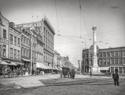 Norfolk, Virginia, 1905. "Main Street and Market Square (i.e., Commercial Place)." At the crossroads of Painless Dentistry. At right, the Norfolk Confederate Monument two years before completion, minus its "Johnny Reb" statue. 8x10 inch glass transparency. View full size.