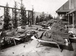 Chicago circa 1917. "Rest period, Elizabeth McCormick Open Air School No. 2, on roof of Hull House boys club." Or, possibly, naptime on the set of "The Seventh Seal." View full size.
&nbsp; &nbsp; &nbsp; &nbsp;  The Open Air movement, which started in 1908 and ran through the 1930s, provided for the education of children with tuberculosis while at the same time crusading against "ventilating systems which do not ventilate." The movement (one subcategory of which was the "open window school") reflected a prevailing belief in the therapeutic powers of fresh air.  Gelatin silver print by Burke-Atwell.