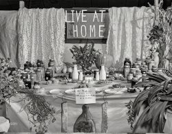 October 1940. "Home demonstration booth at the Caswell County fair. Yanceyville, North Carolina." Photo by Marion Post Wolcott for the Farm Security Administration. View full size.
