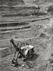 August 1941. "Albany iron mine. Hibbing, Minnesota." A Bucyrus-Erie Model 54-B electric shovel. Acetate negative by John Vachon for the Farm Security Administration. View full size.