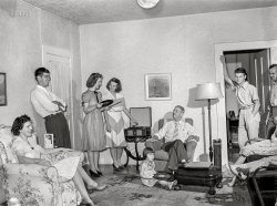 July 1942. "Hayti, Missouri. Family of Glen Eaker (seated), superintendent of the local Rural Electrification Administration (REA) cooperative." Medium format acetate negative by Arthur Rothstein for the U.S. Foreign Information Service. View full size.