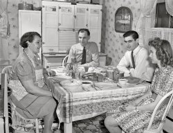 November 1942. "Pittsburgh, Pennsylvania (vicinity). Montour No. 4 mine of the Pittsburgh Coal Company. Andy Piatnik, miner who is an Office of Civilian Defense instructor, and family at home." Acetate negative by John Collier for the Office of War Information. View full size.