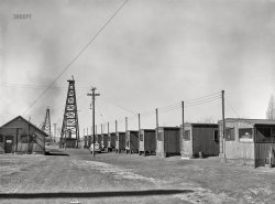 March 1943. "Gallup, New Mexico. Houses for Indian and Mexican workers employed at the Santa Fe Railroad shops." Photo by Jack Delano, Office of War Information. View full size.