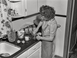 May 1943. "Point Pleasant, West Virginia. Rural life along the Ohio River. Mrs. Ferguson making lemonade." Photo by Arthur S. Siegel for the Office of War Information. View full size.