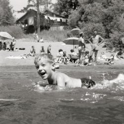Continuing my vacation theme, we return to the same beach ten years earlier. I'm wearing the St. Christopher medal that was then a permanent accouterment, but what really kept me from drowning then and forever afterwards was making sure that my extremities were firmly in contact with the bottom at all times. This was when the Russian River region was the vacation destination for denizens of the San Francisco Bay Area and was jammed with sun and fun frolickers during the summer months. About ten years later, freeways made Lake Tahoe more easily accessible and Guerneville and environs went into a serious and sad decline that lasted until the 1980s. View full size.